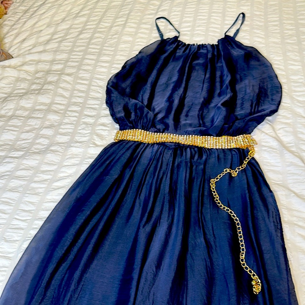 Boutique style navy soft and silky, spaghetti strap jumpsuit. One size